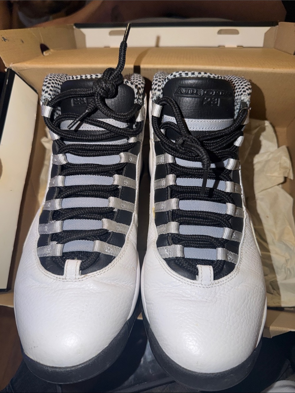 Jordan Men’s White and Black Athletic Sneakers with Silver Accents
